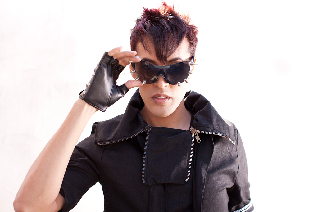 Dario rocking spiked sunglasses and fingerless leather gloves